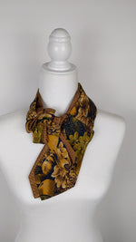Load and play video in Gallery viewer, Double Ascot In A Mustard Floral Print.
