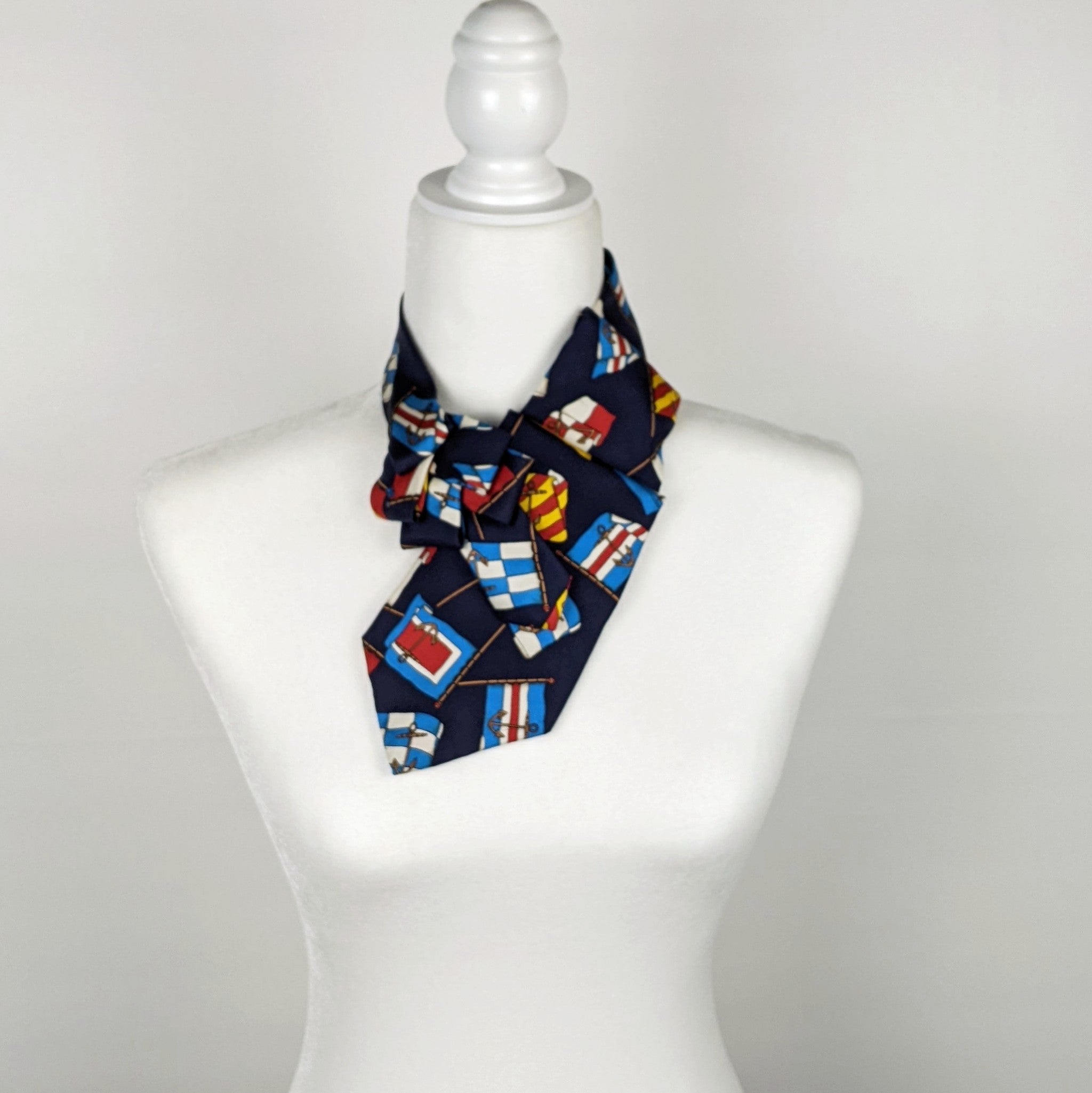 Ascot Scarf In Navy With A Nautical Flag Print.