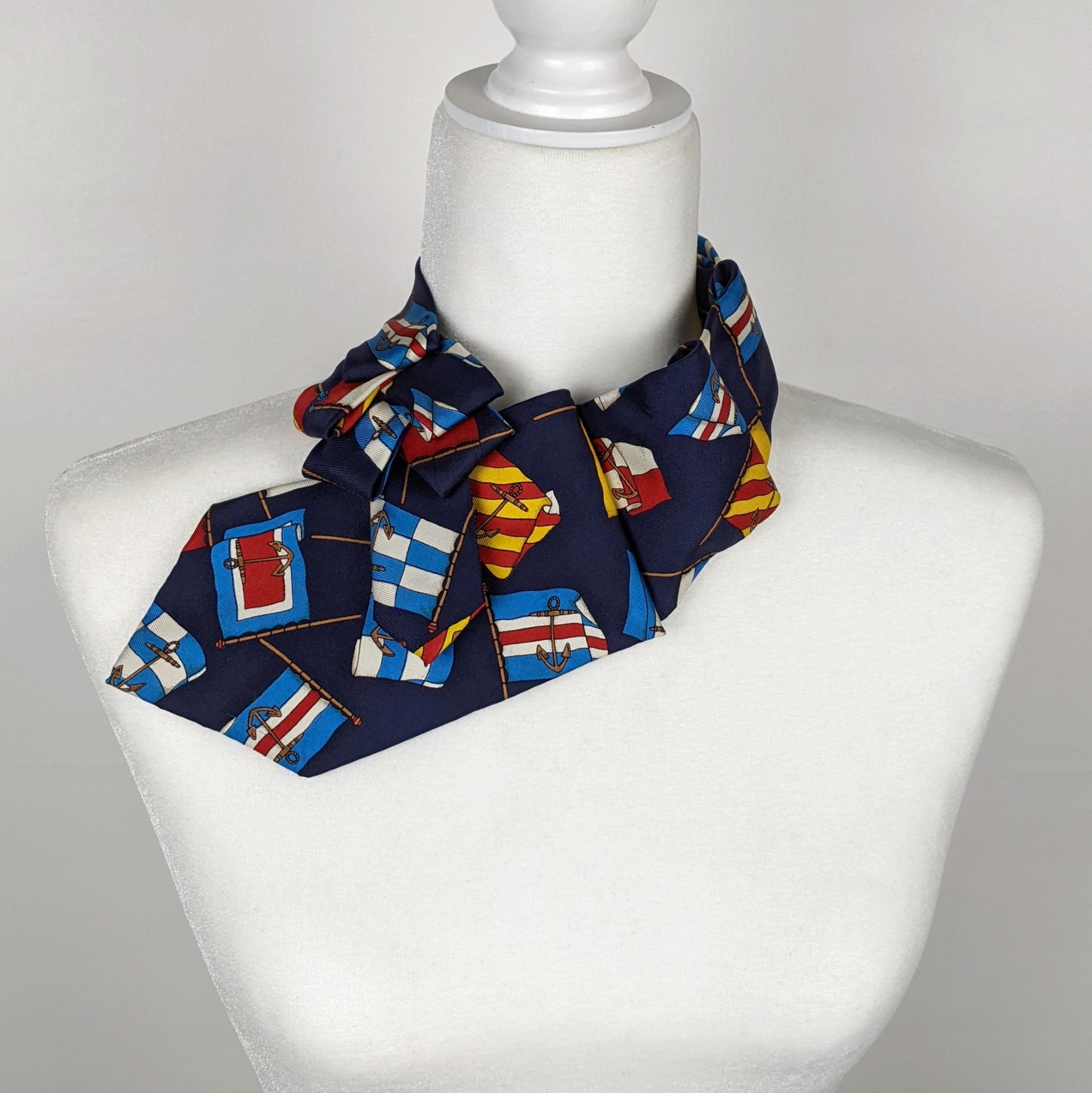 Ascot Scarf In Navy With A Nautical Flag Print.