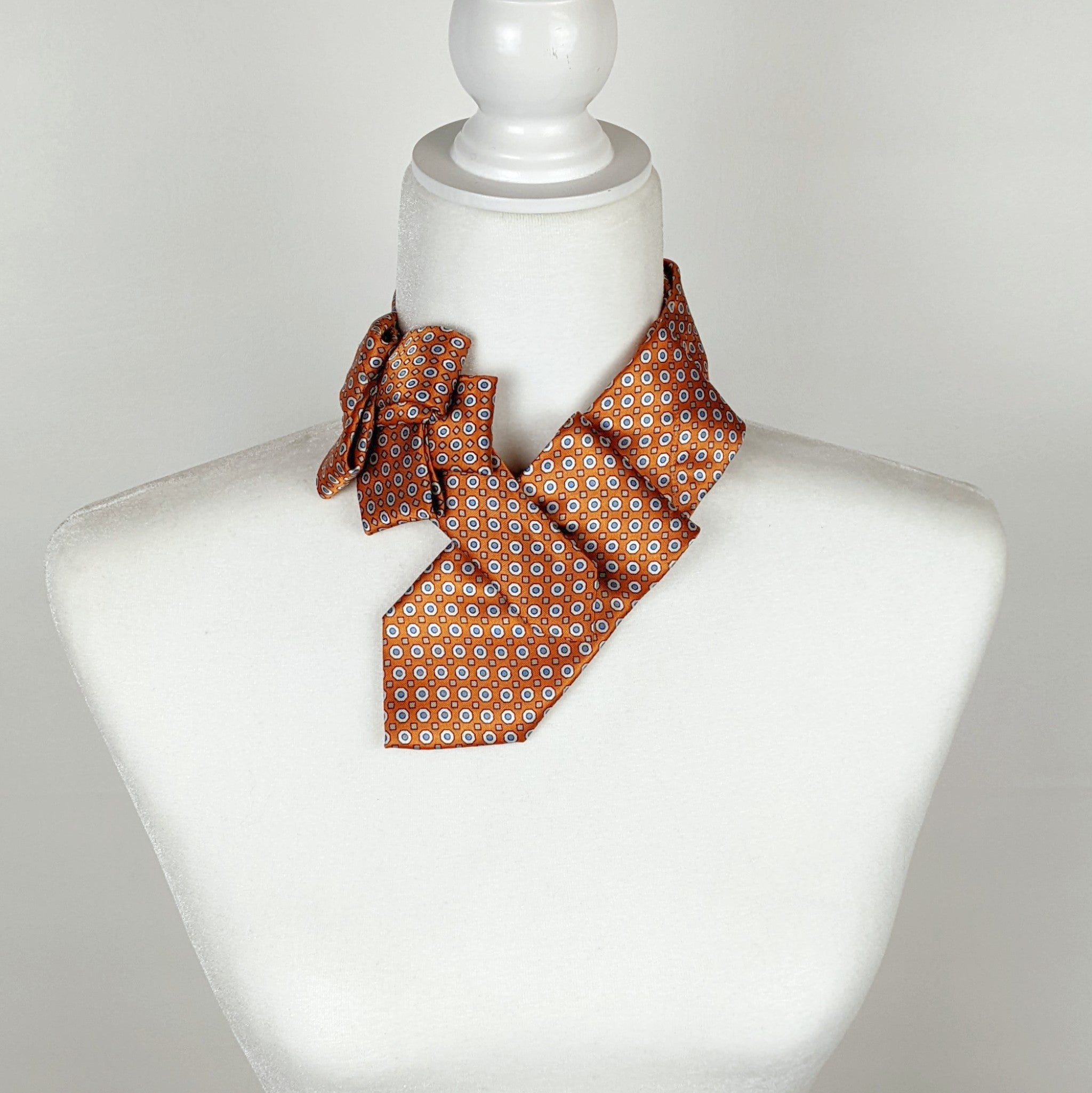 Women's Skinny Ascot In Orange With Blue and White Pin Dots.