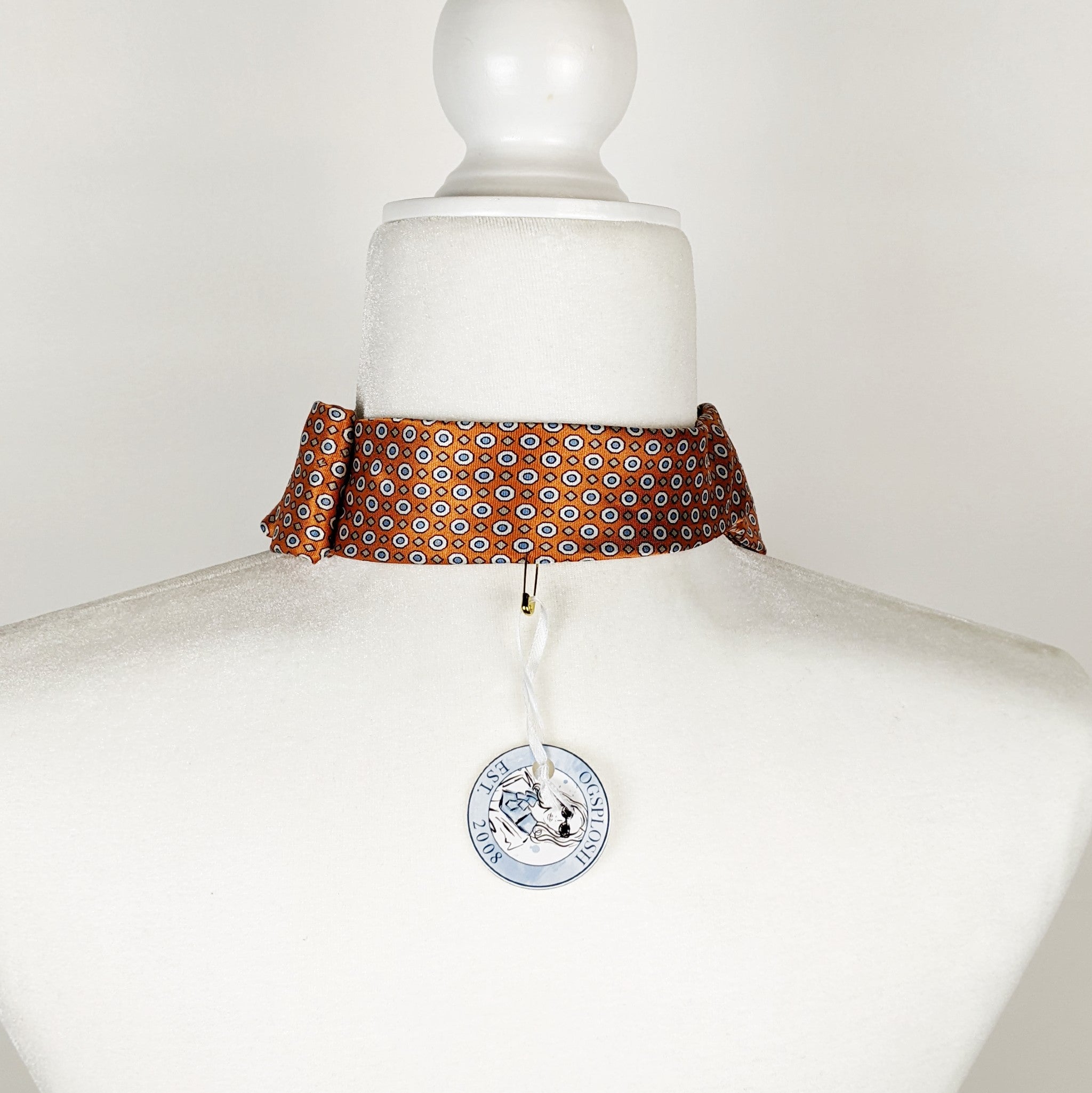 Women's Skinny Ascot In Orange With Blue and White Pin Dots.