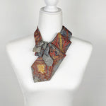 Load image into Gallery viewer, Ascot Scarf In A Grey, Gold And Red Marbled Print
