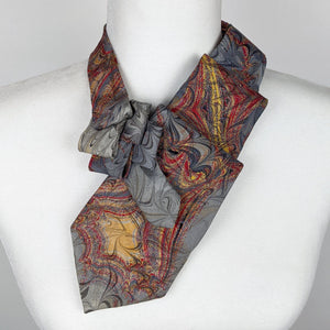 Ascot Scarf In A Grey, Gold And Red Marbled Print