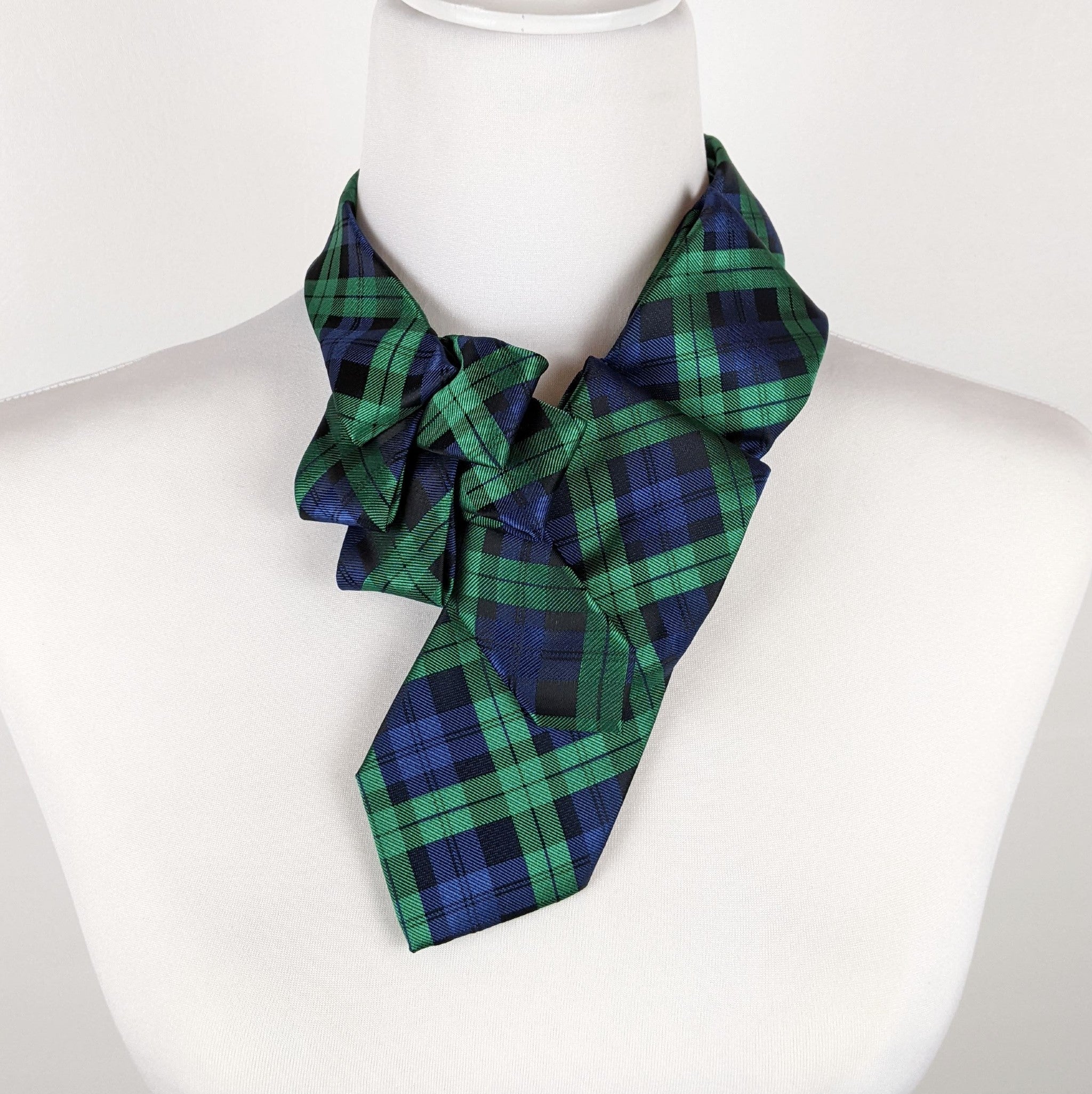 Ascot Scarf In A Navy And Green Tartan Print.