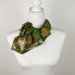 Load image into Gallery viewer, Ascot Scarf In A Green, Orange And Brown Print.
