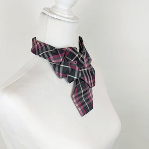 Ascot Scarf In A Grey And Pink Plaid Print.