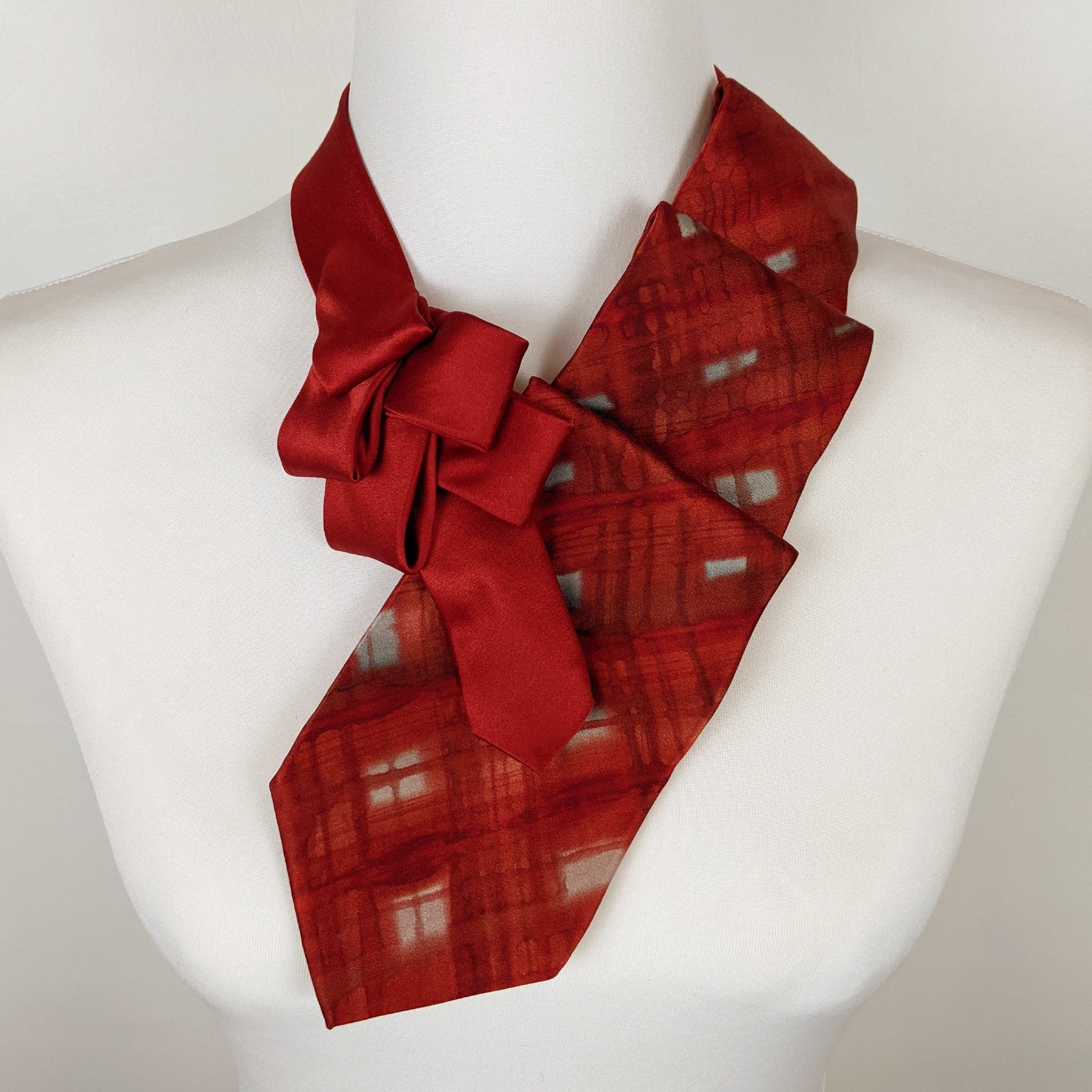 Ascot Scarf In A Red Tie Dye Print.