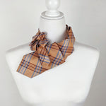Load image into Gallery viewer, Ascot Scarf In Orange Plaid Print.

