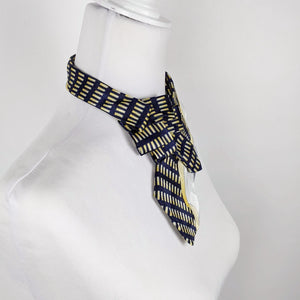 Ascot Scarf In An 80's Print In A Navy, Yellow, White And Grey.