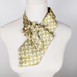 Load image into Gallery viewer, Ascot Scarf In Lemon With A Modern Geometric Print.
