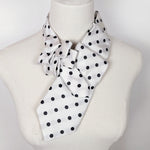 Load image into Gallery viewer, Ascot Scarf In White With A Black Polka Dot Print.
