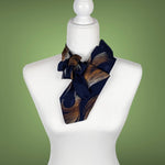 Load image into Gallery viewer, Ascot Scarf In Navy With A Copper Print.
