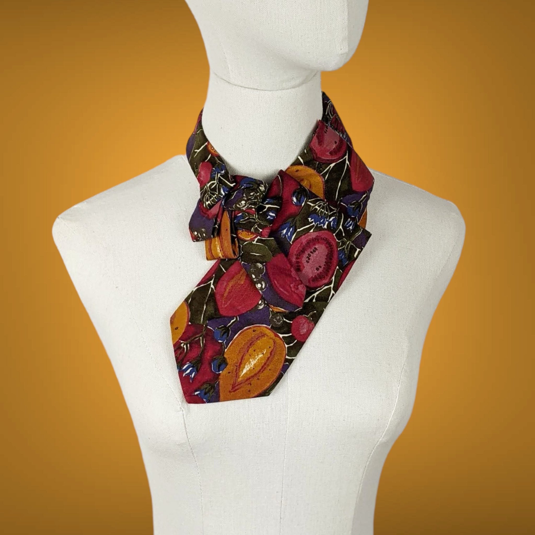 Ascot Scarf In A Green And Red Fig Print.