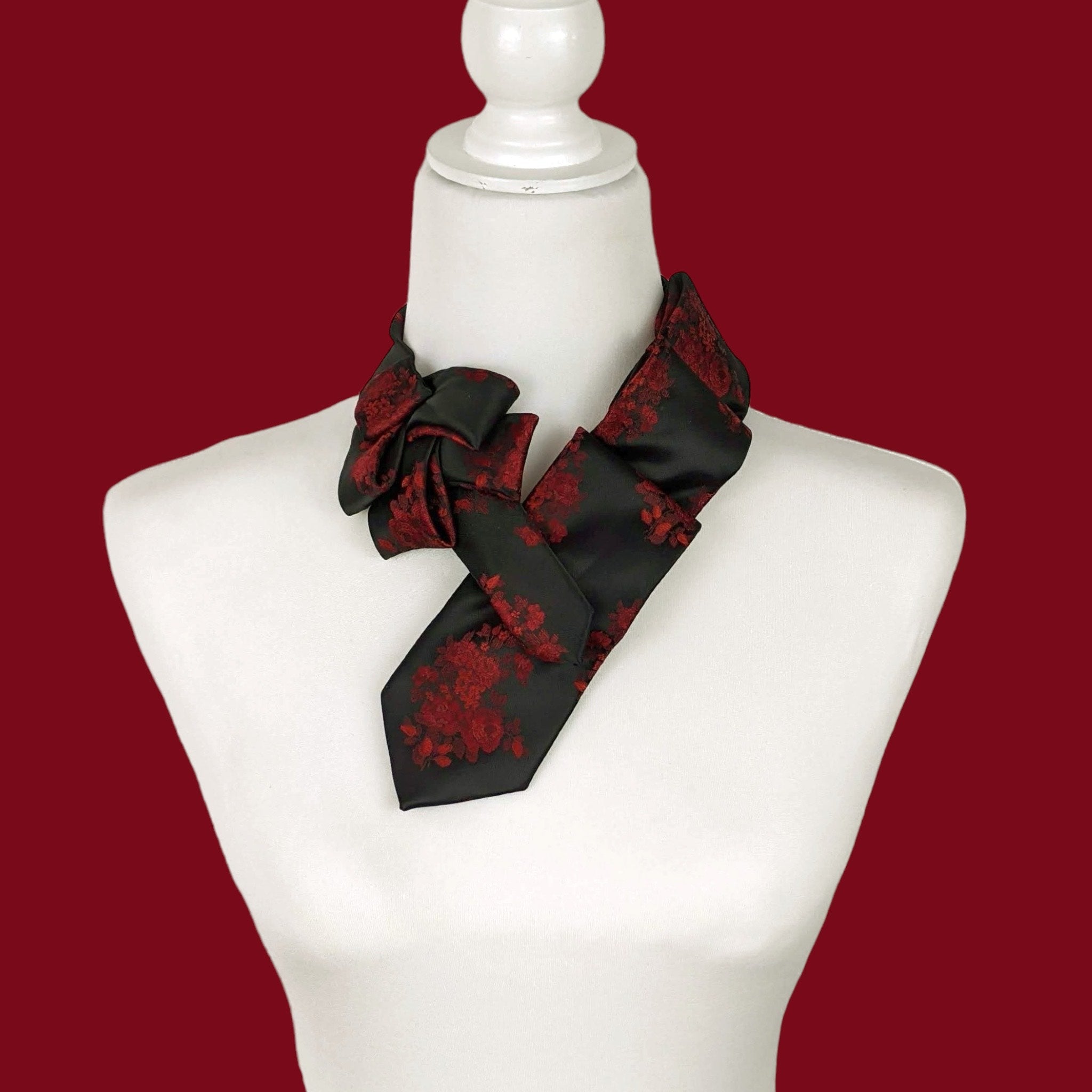 Women's Skinny Black Ascot Scarf With A Red Rose Print.