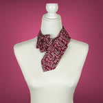 Load image into Gallery viewer, Copy of Ascot Scarf In Black With A Red And Grey Swirl Abstract Print.
