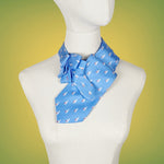 Load image into Gallery viewer, blue ascot scarf with a small print of a figure with a surf board

