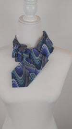 Load and play video in Gallery viewer, Ascot Scarf In A Blue 1970&#39;s Swirl Print

