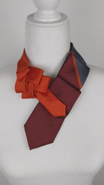 Load and play video in Gallery viewer, Women&#39;s Skinny Ascot Scarf In Orange, Grey And Wine
