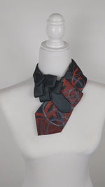 Load and play video in Gallery viewer, Ascot Scarf In Black With A Red And Grey Swirl Abstract Print.
