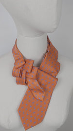 Load and play video in Gallery viewer, Scarf In Orange With A Blue Flamingo Print.
