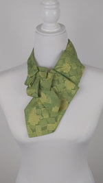 Load and play video in Gallery viewer, Women&#39;s Ascot Scarf In A Retro Lemon And Lime Floral Print.
