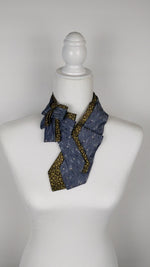 Load and play video in Gallery viewer, Double Ascot In A Grey And Gold Retro Print
