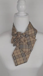 Load and play video in Gallery viewer, Ascot Scarf In Designer Beige Plaid Print
