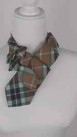 Load and play video in Gallery viewer, Ascot Scarf In A Brown And Green Thompson Tartan Print
