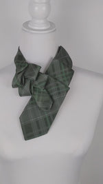 Load and play video in Gallery viewer, Ascot Scarf In A Hunter Green Plaid Print.
