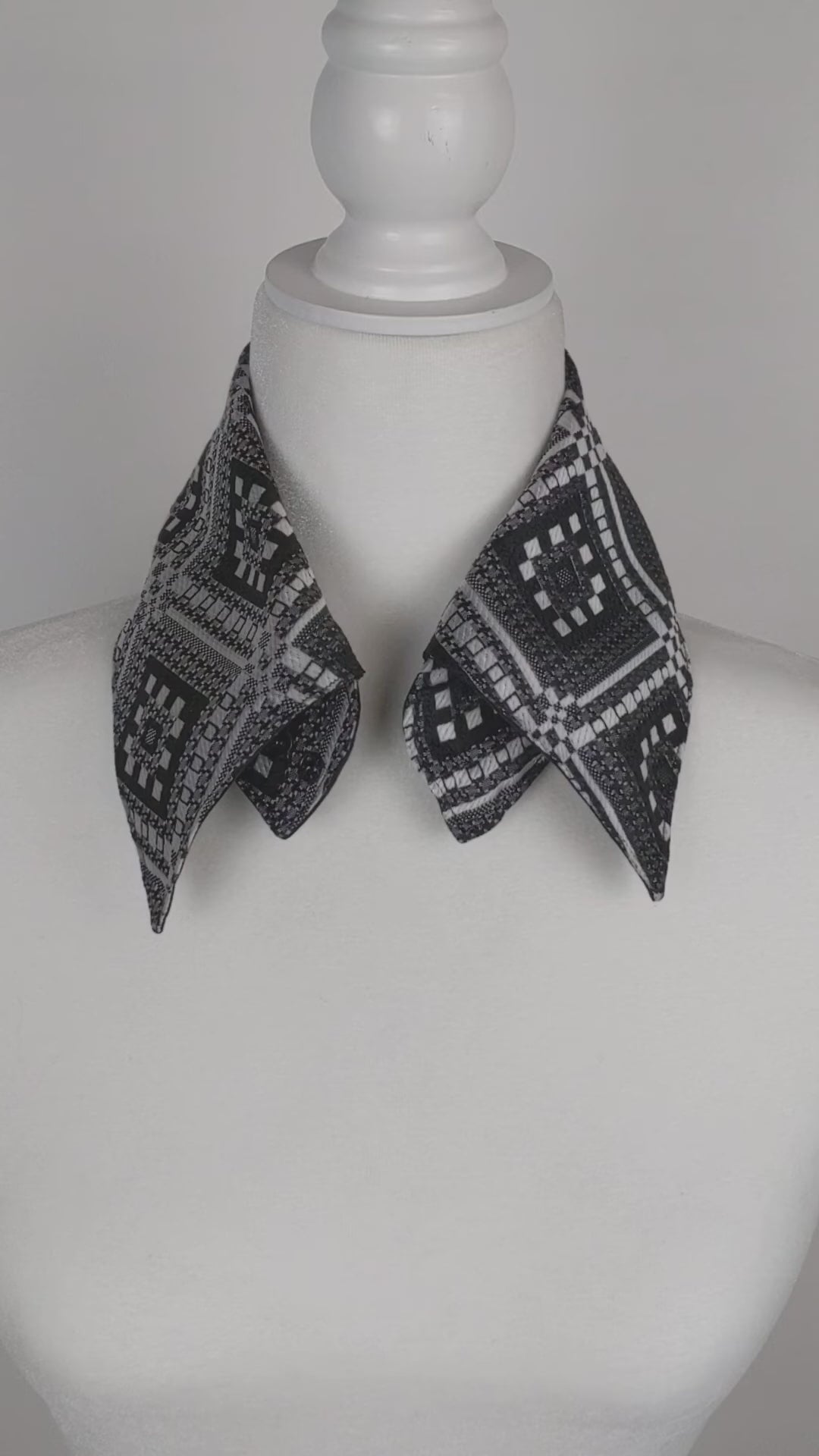Detachable Collar In Black And White 1970's Print.