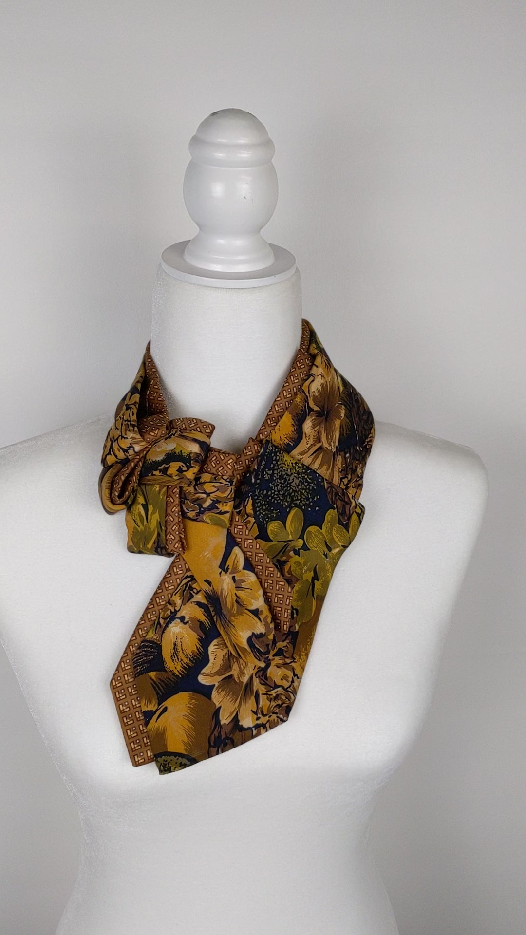 Double Ascot In A Mustard Floral Print.