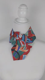 Load and play video in Gallery viewer, Ascot Scarf In A Multi Colored 1980&#39;s Abstract Print
