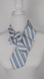 Load and play video in Gallery viewer, Ascot Scarf In A Blue And White Striped Print.
