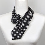 Load image into Gallery viewer, Women&#39;s Skinny Ascot Scarf In Black And White Polka Dots.
