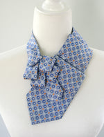 Load image into Gallery viewer, Women&#39;s Ascot Scarf In Sky Blue With Blue And Orange Foulard Print.
