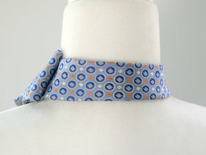 Women's Ascot Scarf In Sky Blue With Blue And Orange Foulard Print.