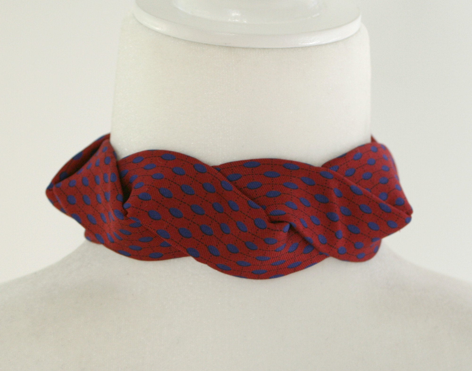 red choker with blue dots