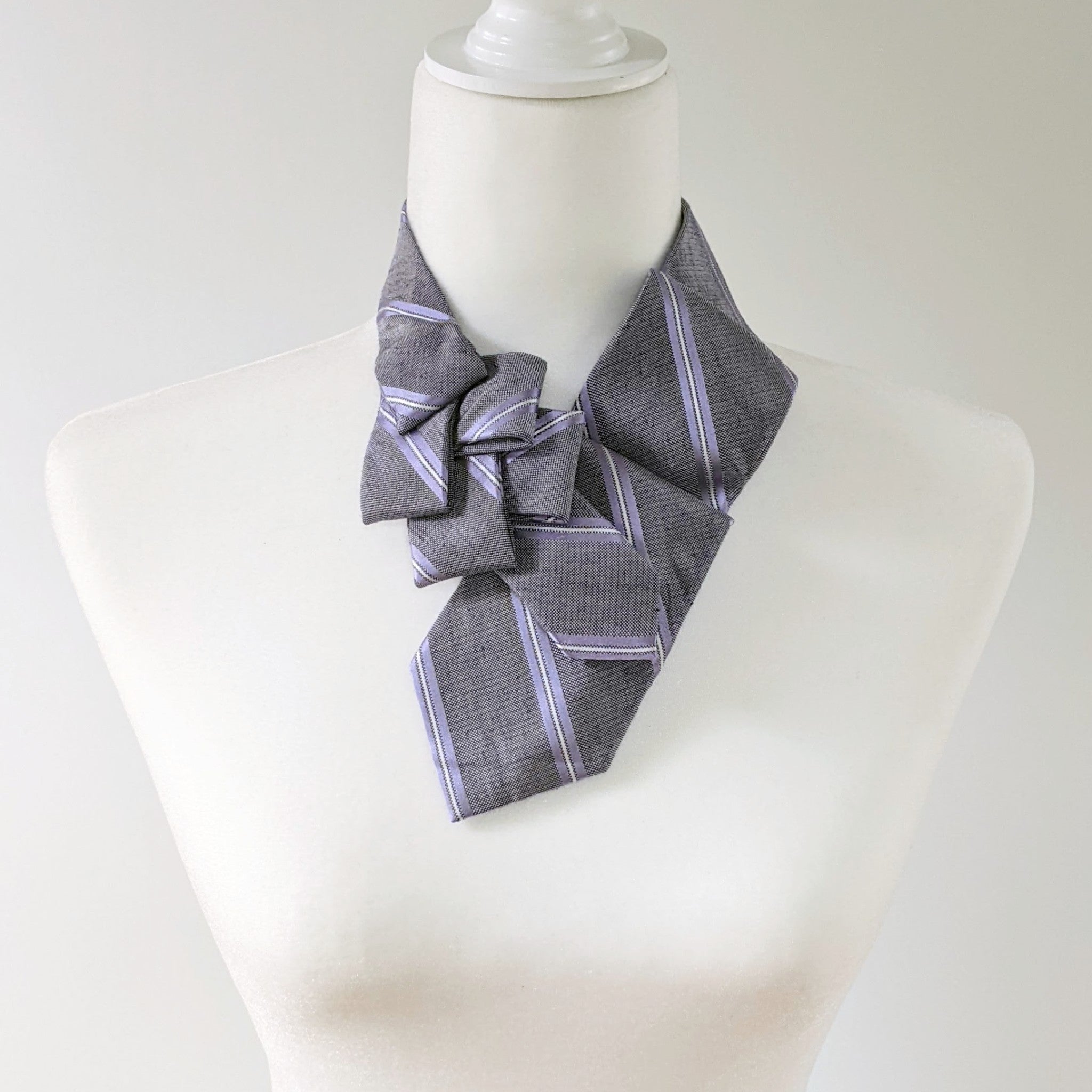 Women's Ascot Scarf In Lilac With A Striped Print.